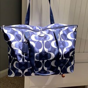 Coach signature nylon bag and snap.